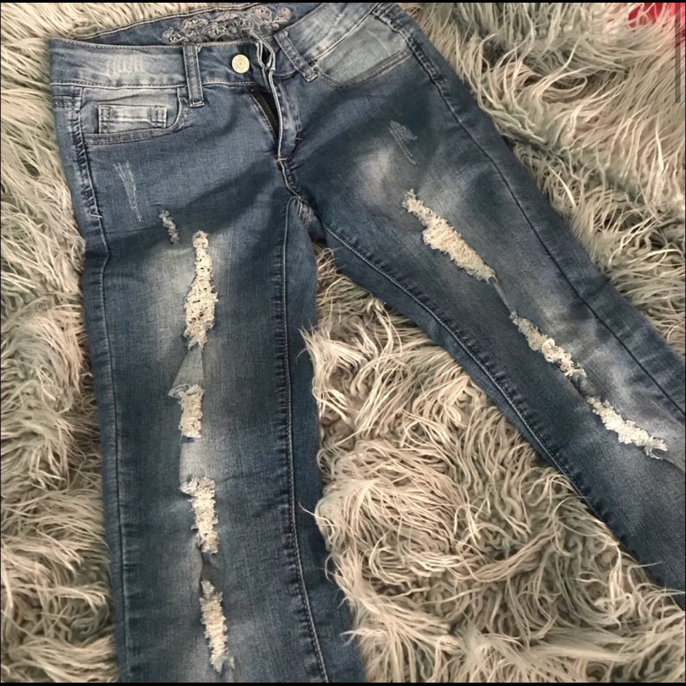 “Wax jeans” ripped jeans